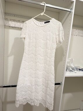White mid length dress